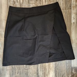 Black mini skirt with high slit